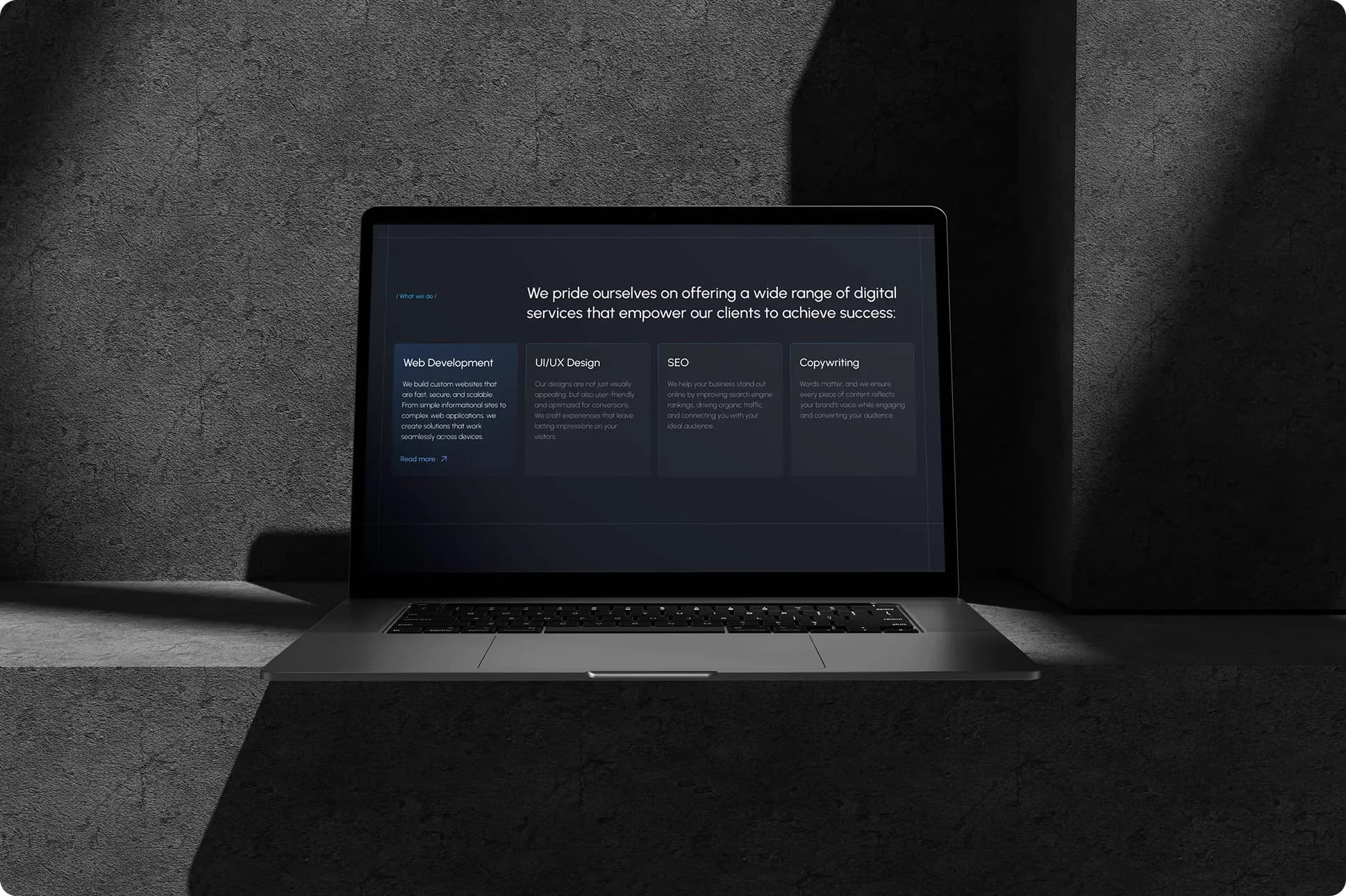 Front view of an open laptop with a website on the screen