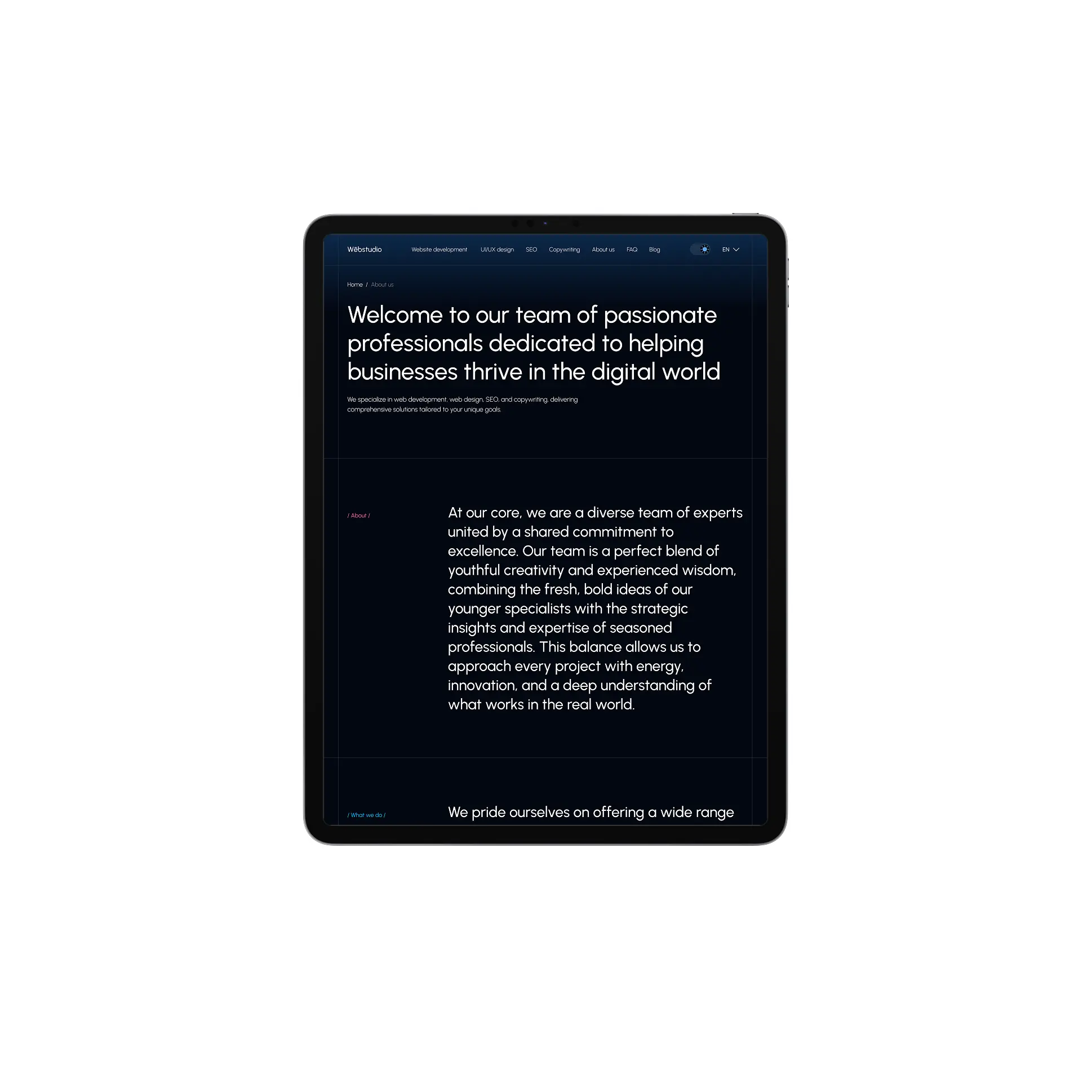 Portrait-oriented tablet with a website on the screen